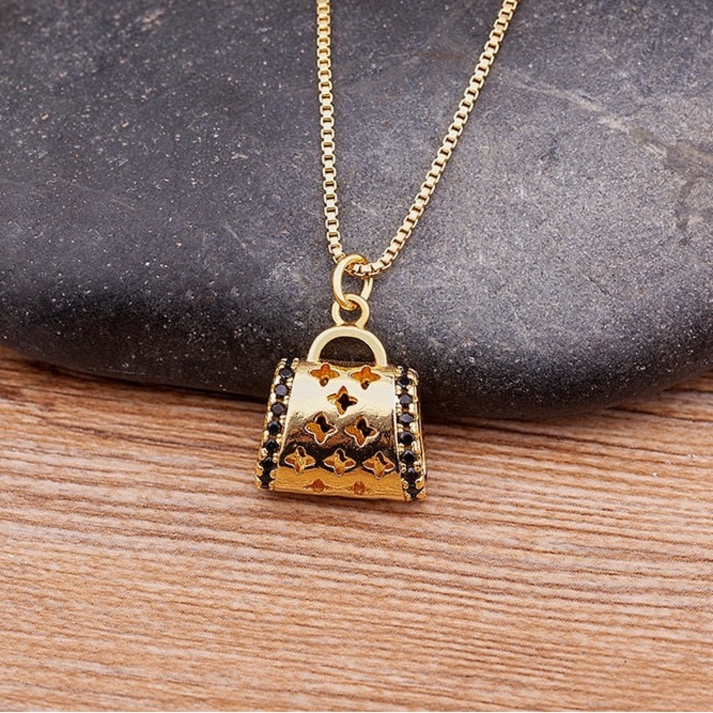 Gold-tone Mini Purse Pendant Necklace